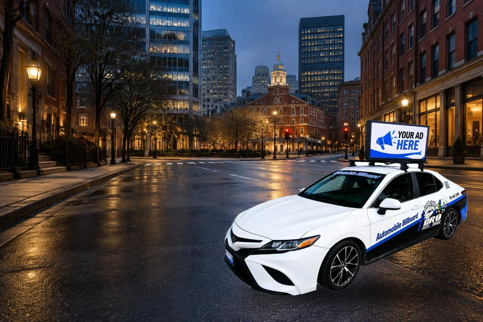 The real Boston Mobile Billboard car on a downtown Boston street